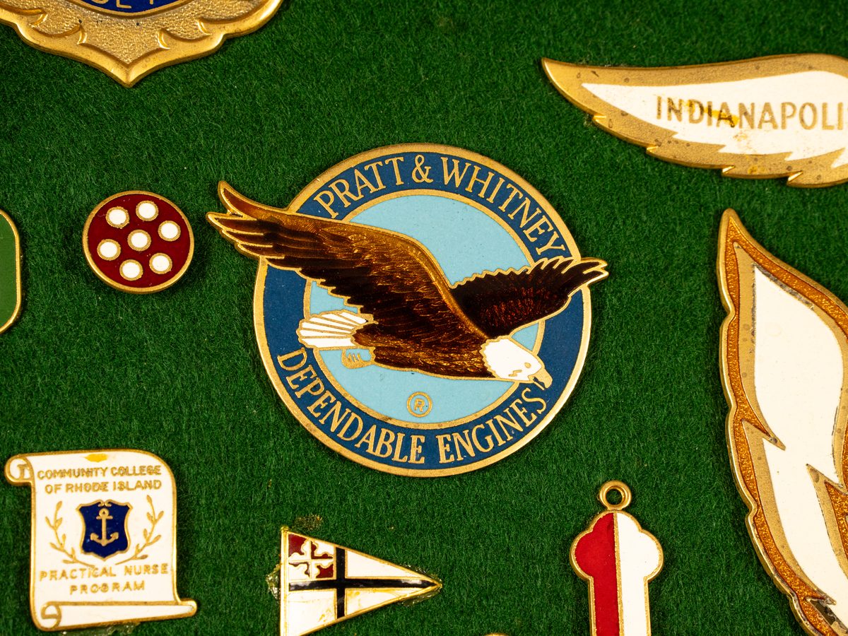 Aviation and motorsport insignia in hard-fired enamel