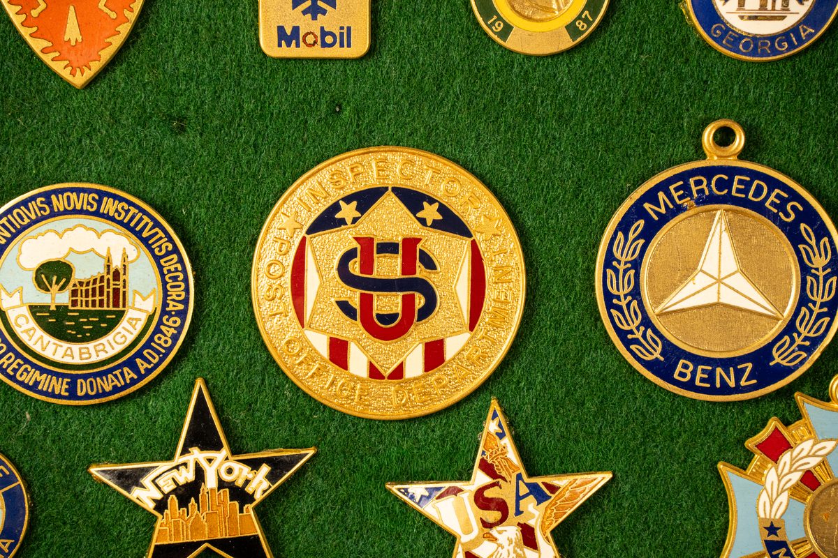 Commercial medallions and emblems including automotive marques